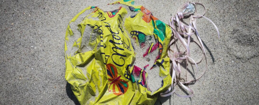 balloon trash on beach