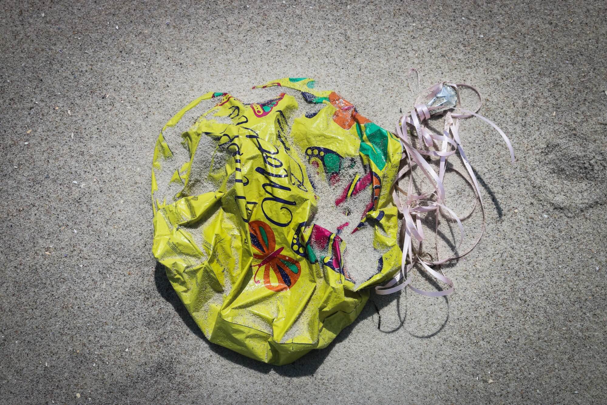 balloon trash on beach