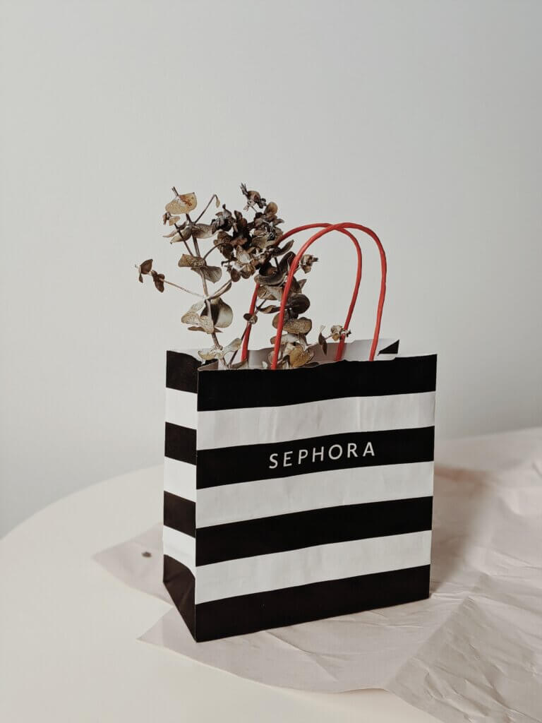 Black and white Sephora bag on table
