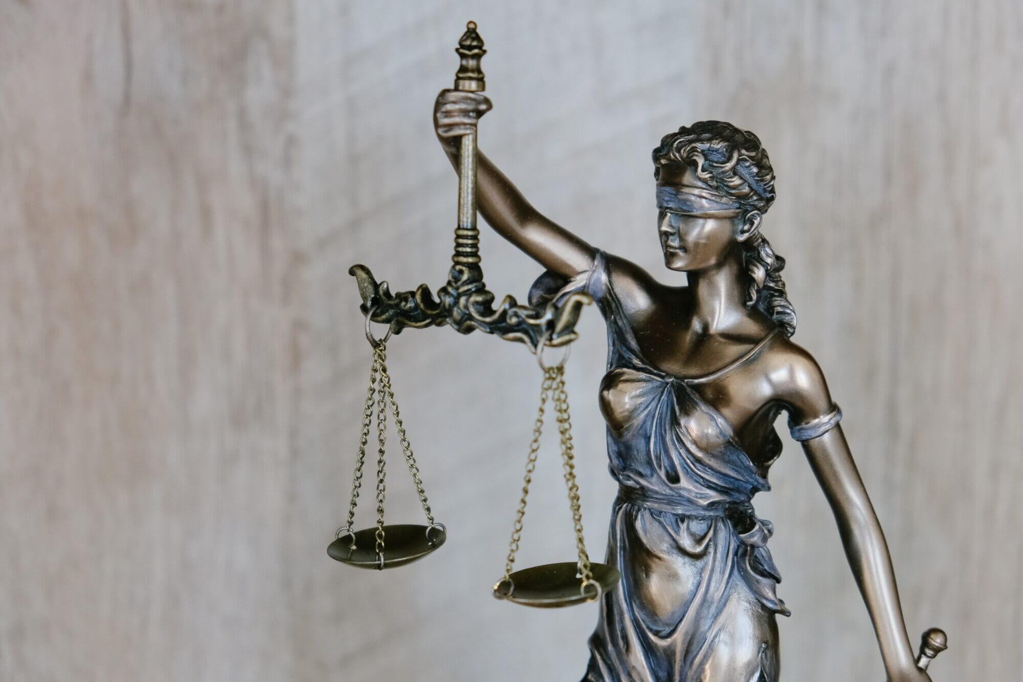 Image from Unsplash of the scales of justice