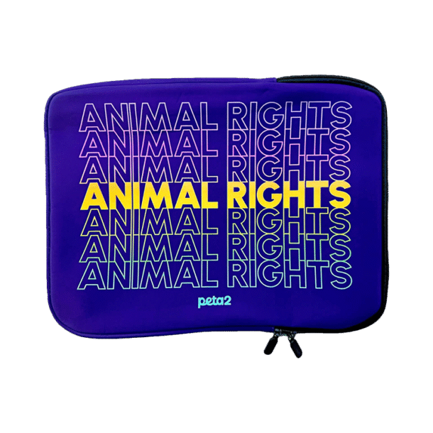 A purple laptop sleeve that reads "Animal Rights"
