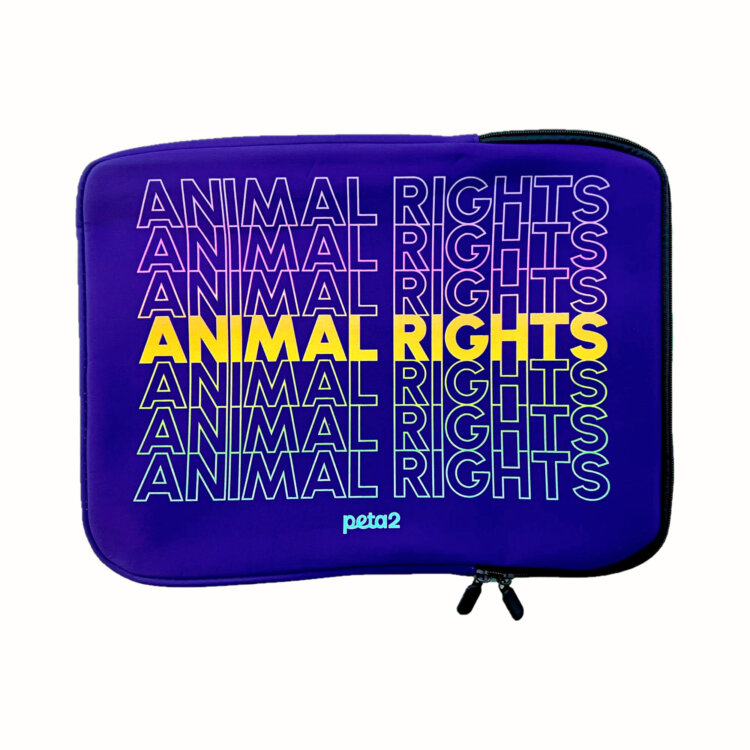 A purple laptop sleeve that reads "Animal Rights"