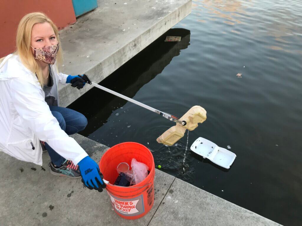 PETA-owned image of a person trash fishing