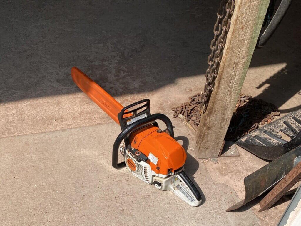 PETA-owned image of a chainsaw from https://investigations.peta.org/bear-country-usa/