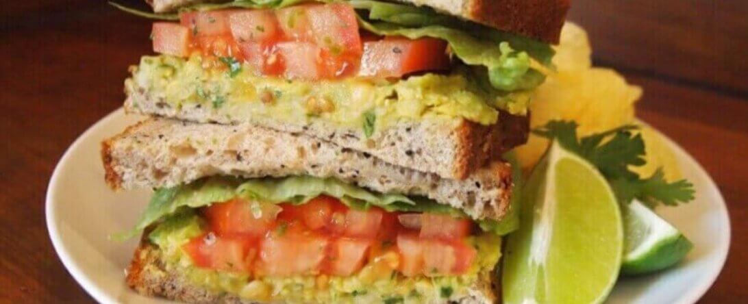 PETA-owned image of a vegan sandwich from https://www.peta2.com/lifestyle/recipes/smashed-chickpea-and-avocado-salad-sandwich/