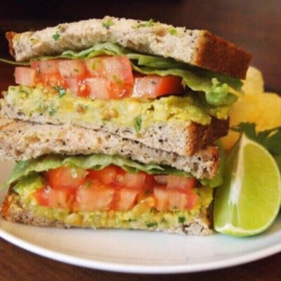 PETA-owned image of a vegan sandwich from https://www.peta2.com/lifestyle/recipes/smashed-chickpea-and-avocado-salad-sandwich/
