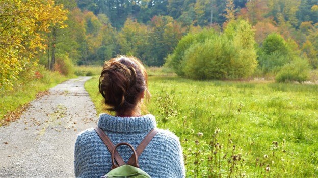 Image from Pixabay of person taking a walk for grieving the loss of companion animal